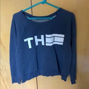 A blue crew neck
